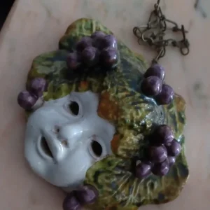 maschera di bacco uva in maiolica italy