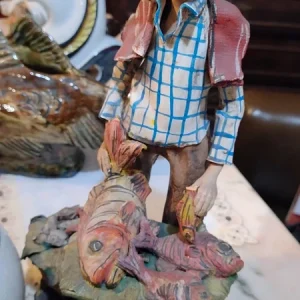 scultura vintage di mercante in ceramica di capodimonte anni '60